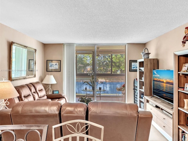 tiled living room with a textured ceiling