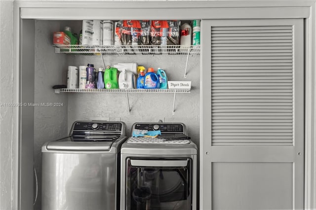 washroom featuring independent washer and dryer