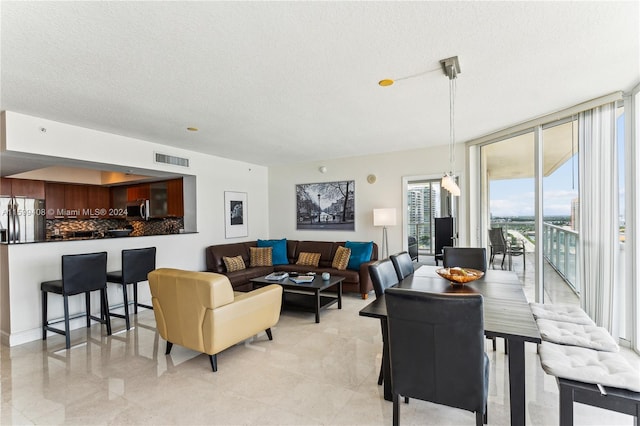 living room featuring a textured ceiling