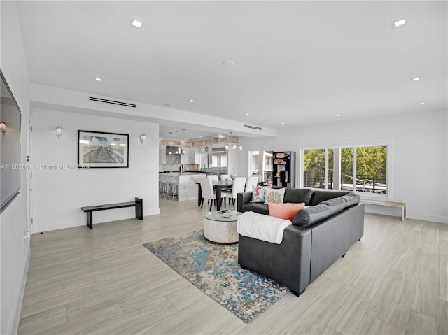 living room with light wood-type flooring