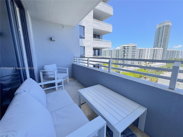 balcony featuring outdoor lounge area