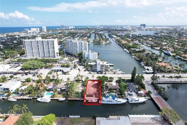 birds eye view of property featuring a water view