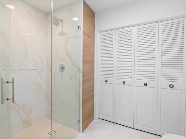 bathroom featuring tile walls and walk in shower