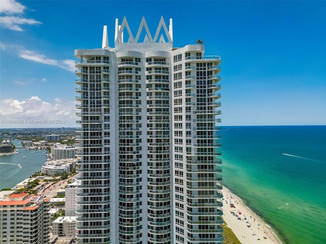 view of building exterior featuring a water view