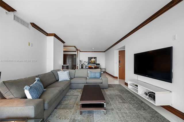 living room with crown molding and tile flooring