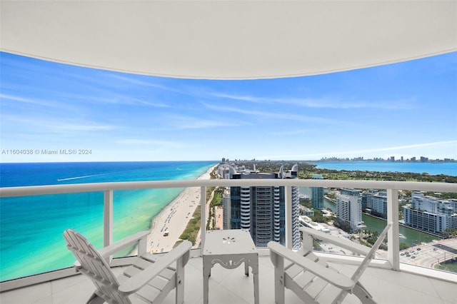 balcony featuring a water view