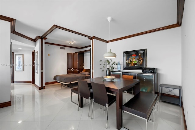 tiled dining space with crown molding