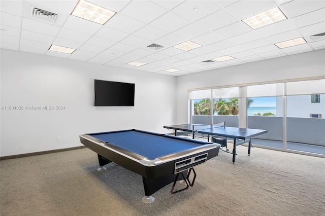 playroom with pool table, carpet floors, and a drop ceiling