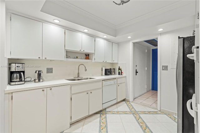 kitchen featuring stainless steel fridge, tasteful backsplash, dishwasher, light tile floors, and sink