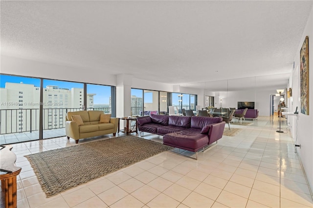 tiled living room with a textured ceiling