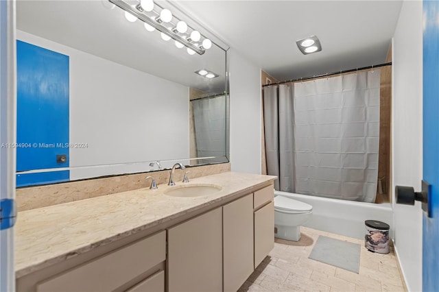 full bathroom with tile flooring, vanity, toilet, and shower / tub combo with curtain