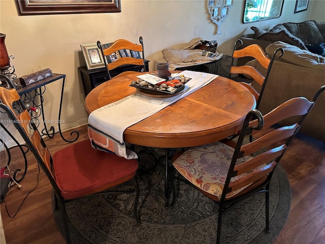 dining room featuring dark wood-type flooring