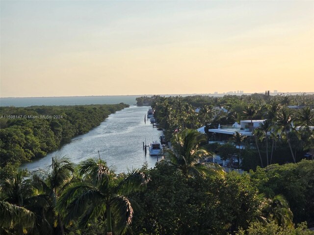 aerial view at dusk with a water view