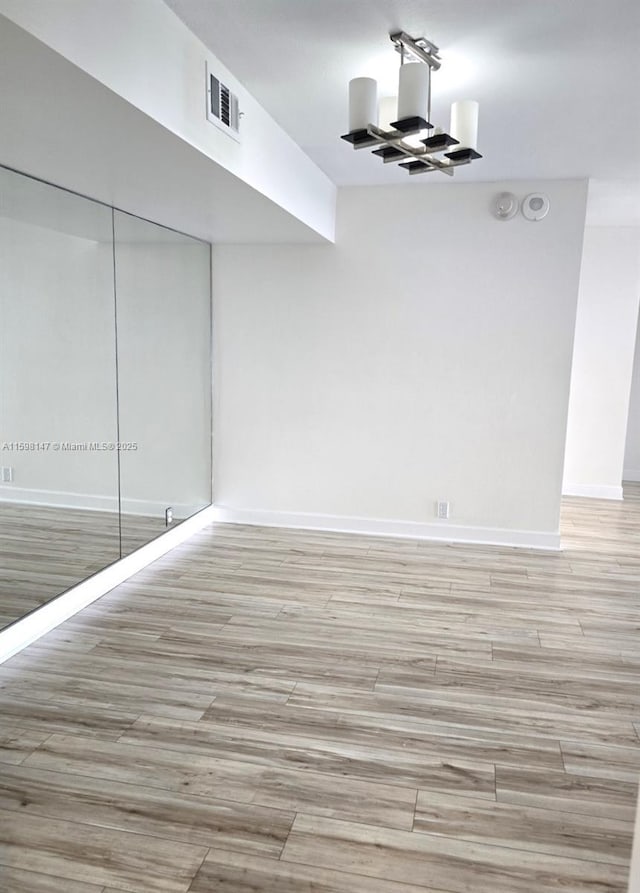 1121 Crandon Blvd Unit D604, Key Biscayne, FL 33149 - interior space with visible vents, light wood finished floors, and baseboards