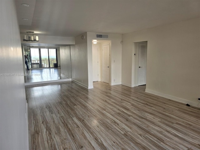 empty room featuring hardwood / wood-style flooring