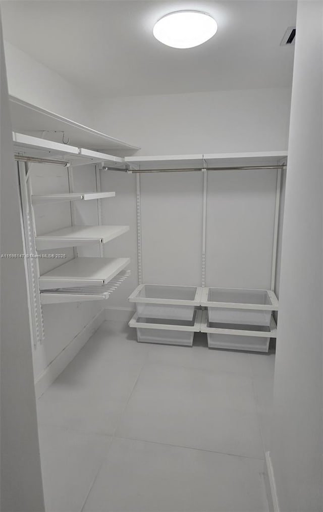 1121 Crandon Blvd Unit D604, Key Biscayne, FL 33149 - spacious closet with tile patterned floors