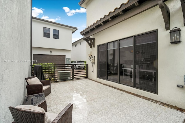 view of patio with a garage