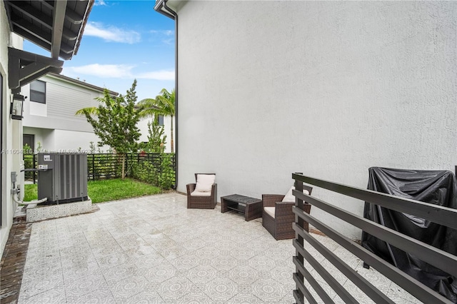 view of patio with central AC unit