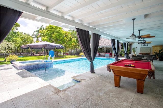 view of swimming pool featuring ceiling fan, a patio area, and an in ground hot tub