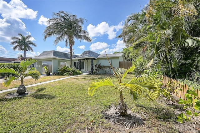 view of front of home with a front lawn