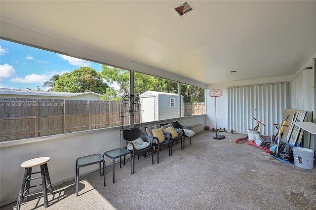 view of patio / terrace with a storage shed