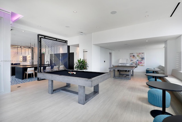 recreation room featuring light hardwood / wood-style floors and billiards