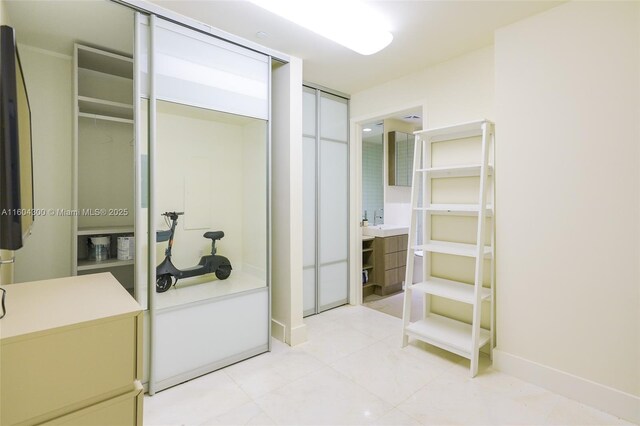 interior space featuring tile flooring and vanity