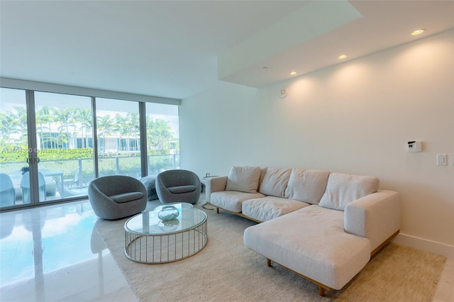 tiled living room with expansive windows