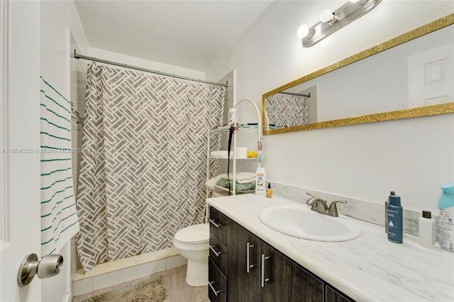 bathroom featuring a shower with curtain, vanity, toilet, and tile patterned flooring