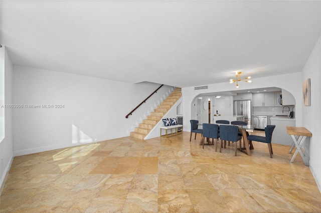 dining room featuring sink