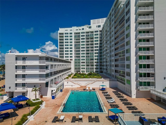 view of swimming pool featuring a patio