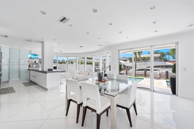 dining space with light tile patterned floors