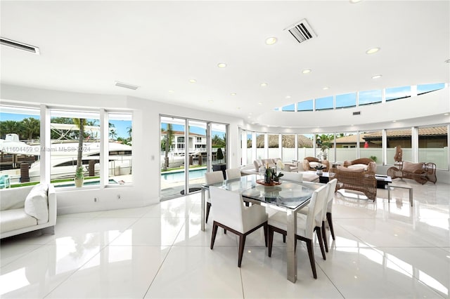 3344 NE 167th St, North Miami Beach, FL 33160 - dining room featuring recessed lighting and light tile patterned floors