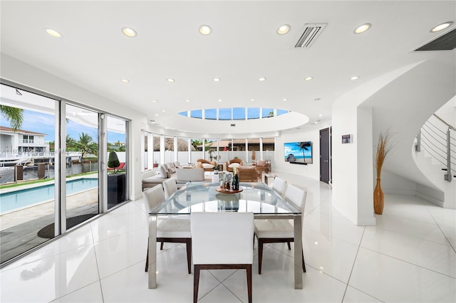 dining area with light tile patterned floors