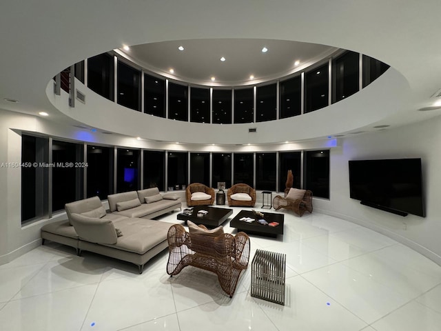 3344 NE 167th St, North Miami Beach, FL 33160 - tiled living room featuring recessed lighting and a high ceiling