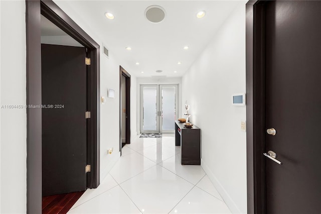 3344 NE 167th St, North Miami Beach, FL 33160 - hall with french doors, recessed lighting, baseboards, and light tile patterned floors