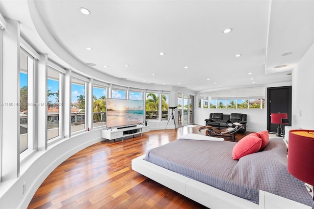 3344 NE 167th St, North Miami Beach, FL 33160 - bedroom with recessed lighting, wood finished floors, and access to exterior