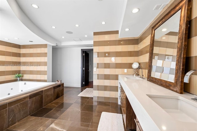 3344 NE 167th St, North Miami Beach, FL 33160 - full bathroom with recessed lighting, a tub with jets, double vanity, and baseboards
