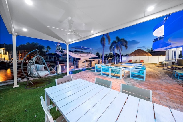 3344 NE 167th St, North Miami Beach, FL 33160 - wooden terrace with a jacuzzi, outdoor dining area, a patio area, and a fenced backyard