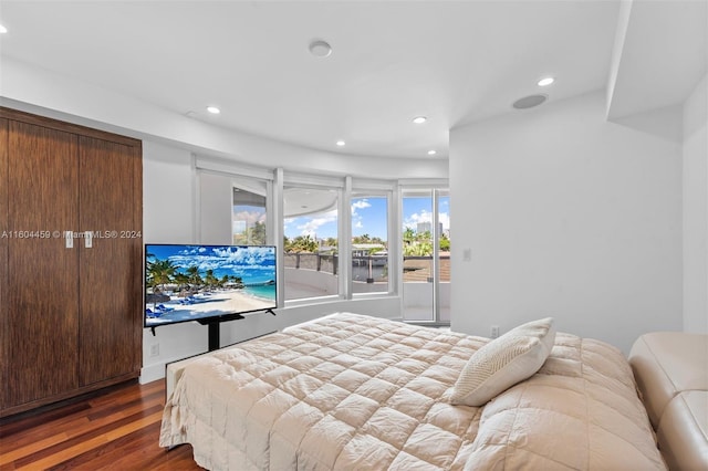 3344 NE 167th St, North Miami Beach, FL 33160 - bedroom featuring access to exterior, wood finished floors, and recessed lighting