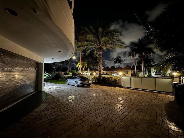 patio at night with a carport