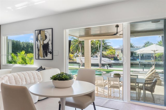 dining space with a water view