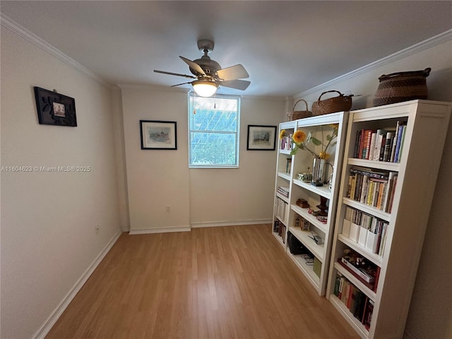 unfurnished room with ceiling fan, light hardwood / wood-style flooring, and crown molding