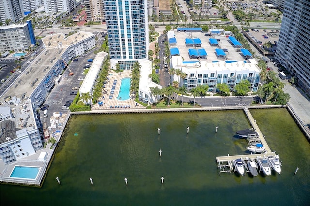 bird's eye view featuring a water view and a city view