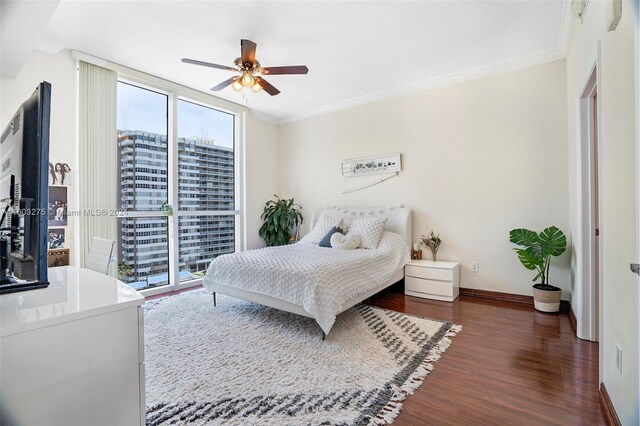 bedroom with crown molding, access to exterior, ceiling fan, and dark hardwood / wood-style flooring