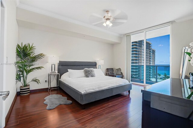 bedroom featuring ornamental molding, hardwood / wood-style flooring, access to exterior, floor to ceiling windows, and ceiling fan