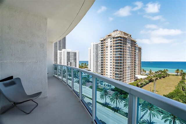 balcony featuring a water view