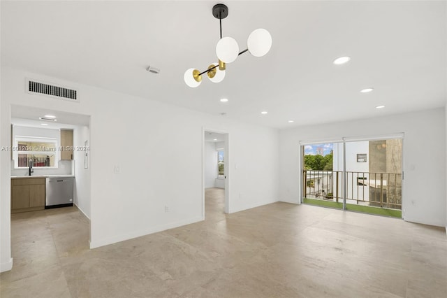 unfurnished room featuring sink and light tile floors