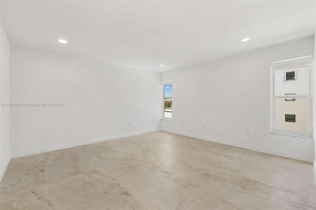 spare room with light tile floors