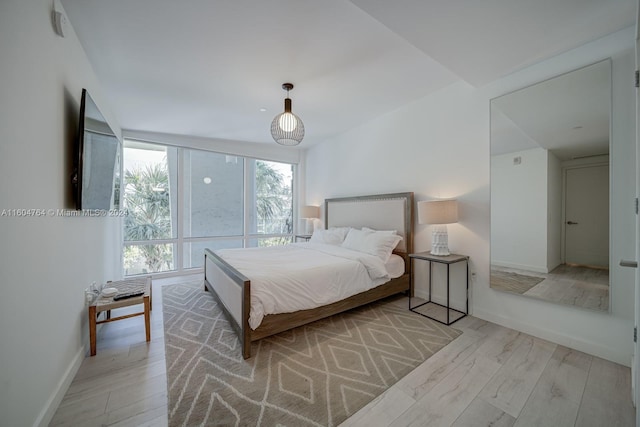 bedroom featuring light hardwood / wood-style flooring